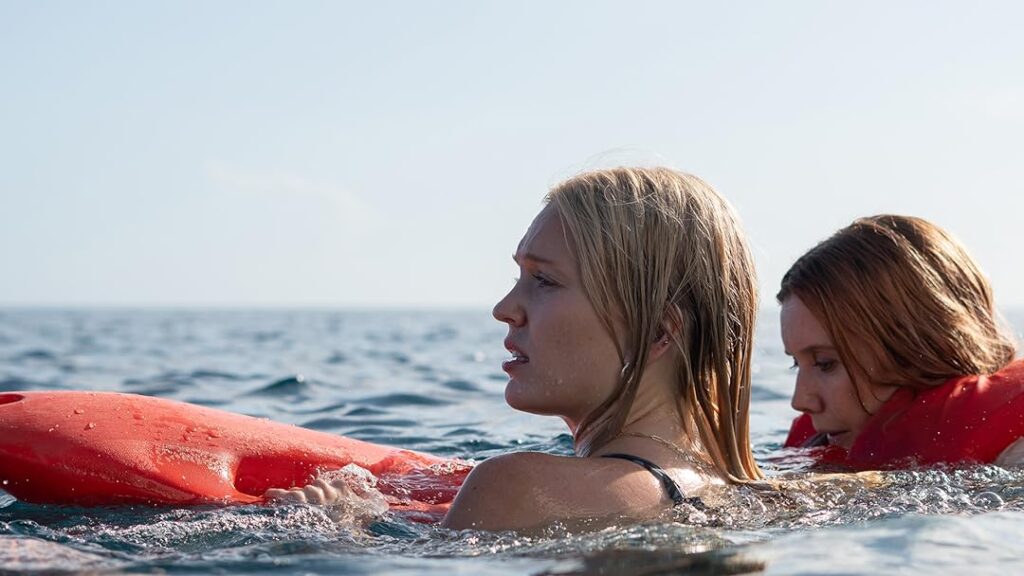 cinco náufragas, un conflicto y un tiburón