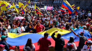 Venezolanos marchan en defensa de los migrantes y rechazan complicidad de la extrema derecha