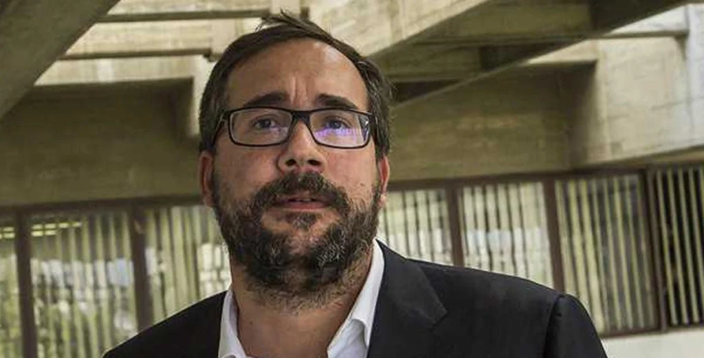 Habla el académico y politólogo Michael Penfold tras ser designado en 'Comisión de Convivencia y Paz' del Gobierno encargado